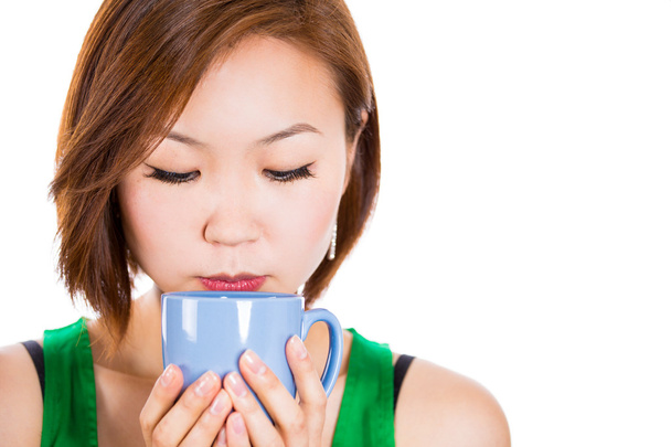 Happy woman drinking her tea. - Foto, Imagen