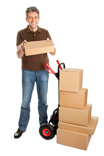 Delivery man holding the package - Foto, imagen