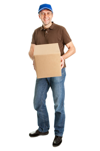 Delivery man holding package box - Photo, image
