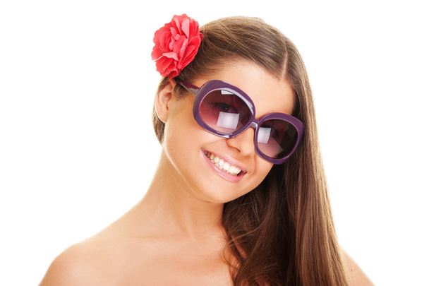 Smiley young woman in sunglasses - Photo, Image