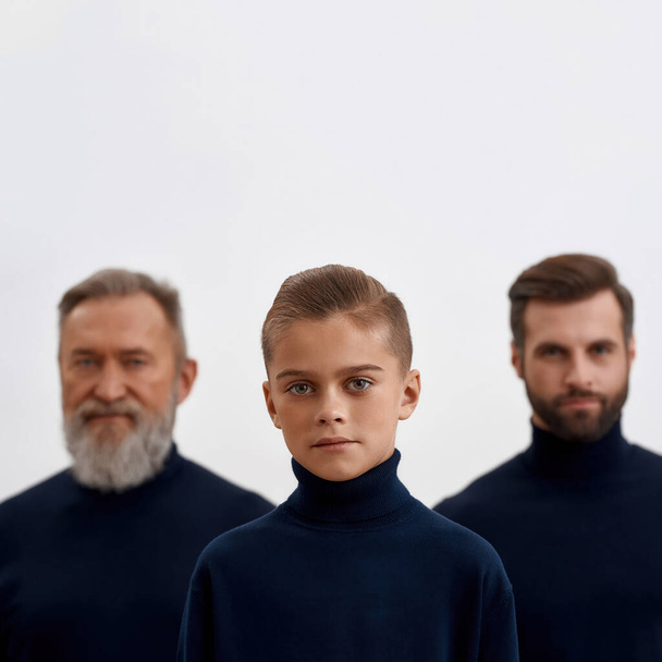 Portrait of small boy child pose with father and grandfather - Фото, зображення