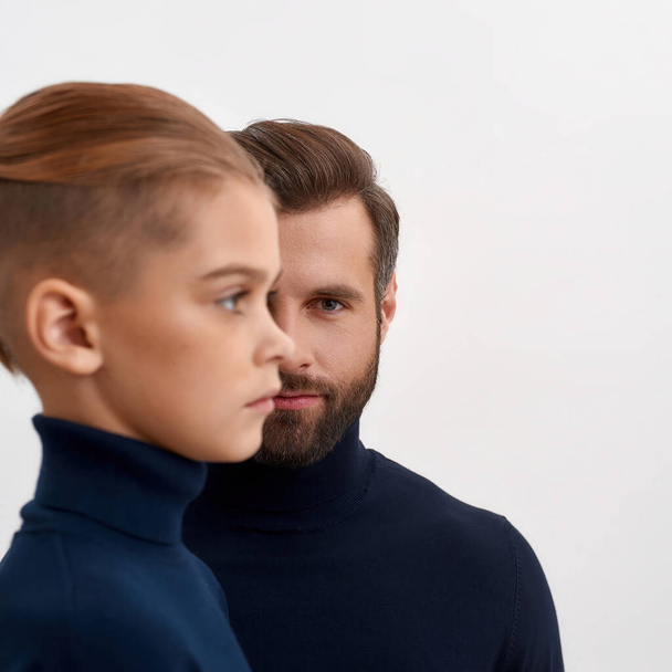 Portrait of young Caucasian dad and teen son - Fotografie, Obrázek