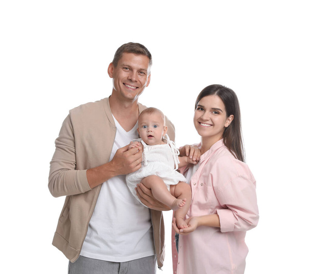 Portrait of happy family with their cute baby on white background - Foto, Bild