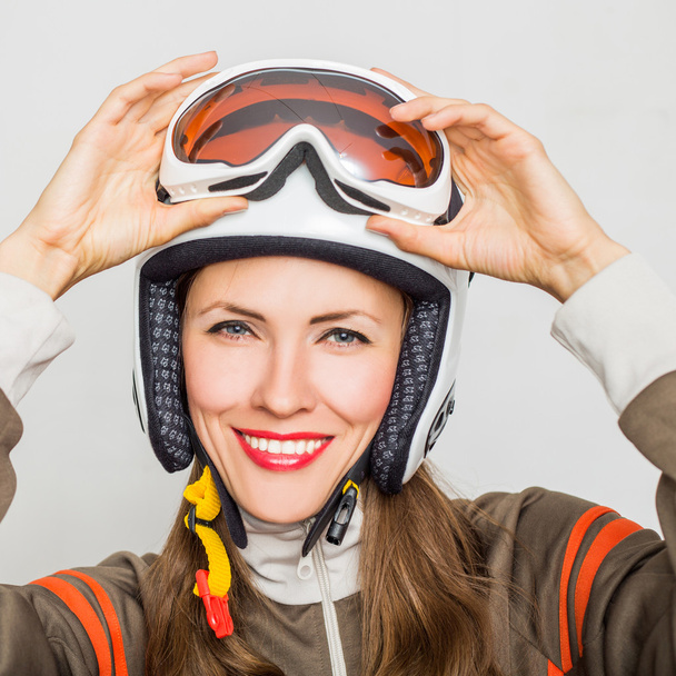 Woman with ski goggles isolated on white - Fotoğraf, Görsel
