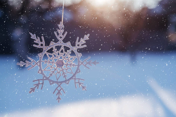 Snowflake decor on the snow winter holidays background - Valokuva, kuva