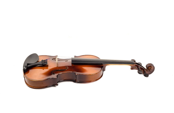 Violin with shadow on a white background with place for text. Copy space. - Фото, зображення