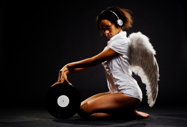 Beautiful angel with vinyl - Фото, изображение