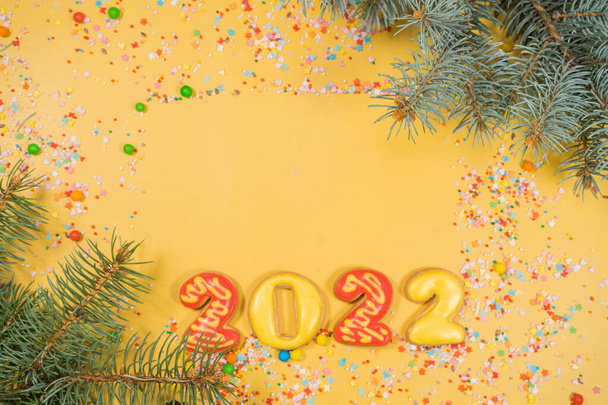 New years 2022 holidays composition on yellow background - Photo, Image