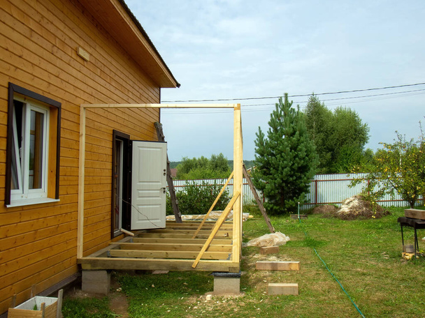 construction of an extension of a rural house, in summer - Photo, Image
