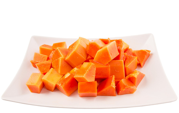 Morso dimensioni Papaya frutta su piatto bianco
 - Foto, immagini