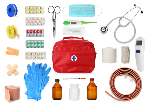 First aid kit. Set with different medical supplies on white background - Photo, Image