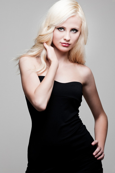 Young woman in black dress - Foto, immagini
