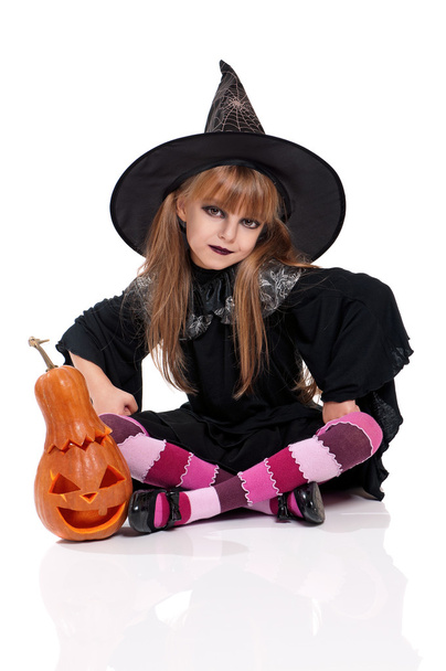 Little girl in halloween costume - 写真・画像
