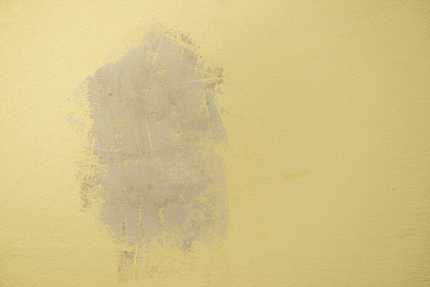 Close up of plastered with gypsum hole in the yellow wall. House renovation concept. - Fotografie, Obrázek