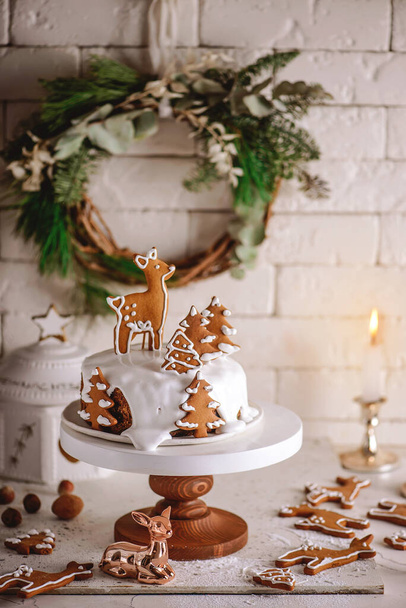 Christmas mature cake on a Christmas rustic background. Style rustic . selective focus - Foto, Imagen