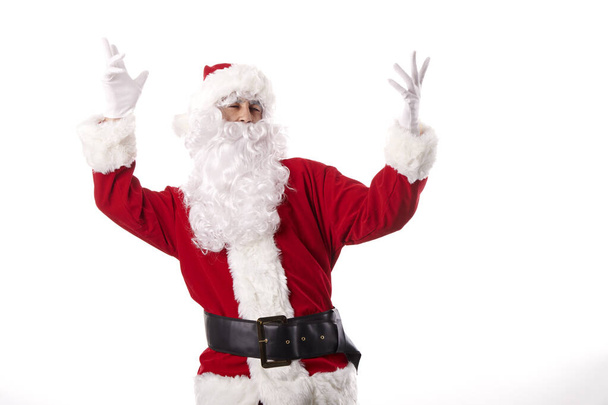 Père Noël faire des gestes sur un fond blanc - Photo, image