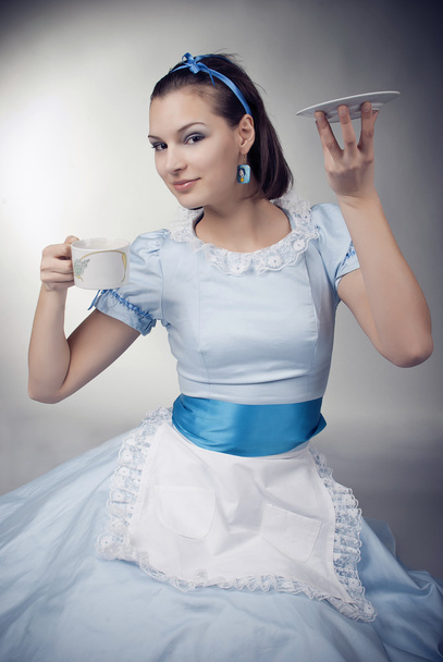 Beautiful girl drinking tea - Фото, зображення