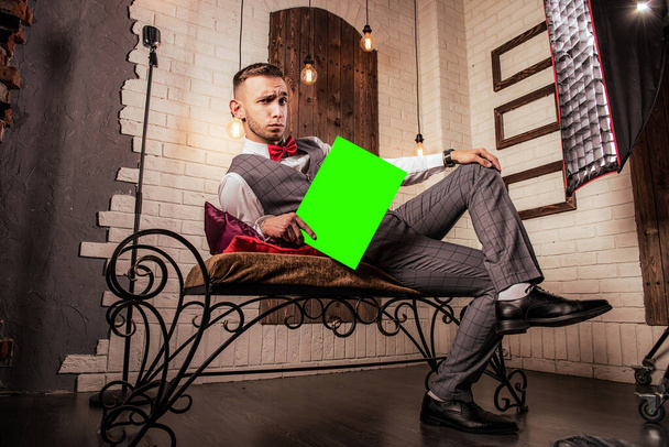 handsome young man sitting with tablet - Φωτογραφία, εικόνα