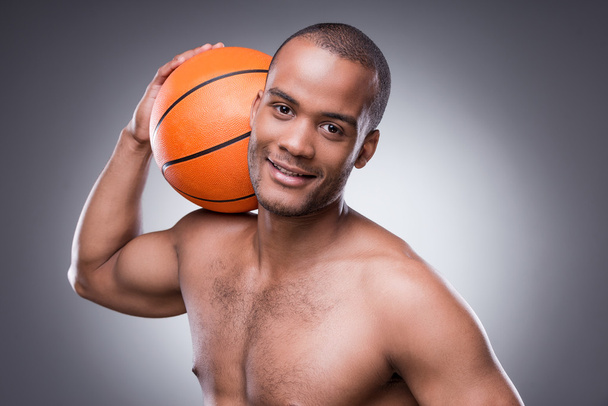 African man holding basketball ball - Fotografie, Obrázek