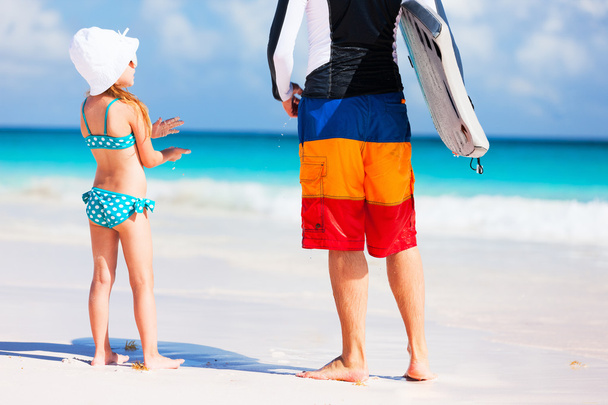 Father and daughter at beach - 写真・画像