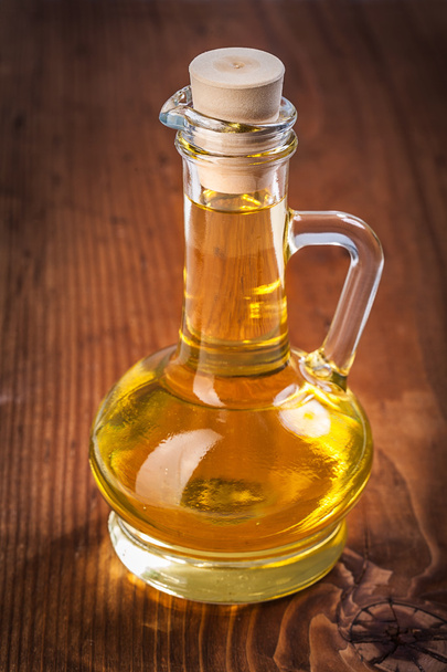 Small bottle with sunflower oil - Photo, image