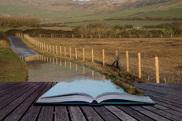 Book concept Landscape image of flooded country lane in farm - Photo, Image