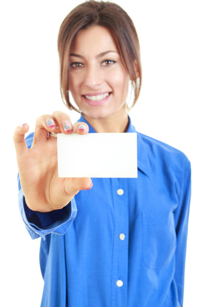 smiling woman in blue shirt holds out a business or credit card - Photo, Image