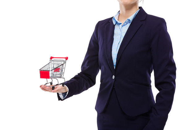 Businesswoman hold with small shopping cart - Photo, Image