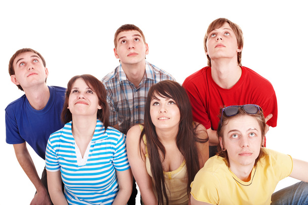 Grupo de jóvenes felices mirando hacia arriba
. - Foto, Imagen