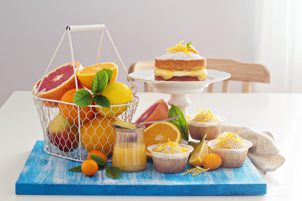 Citrus candy bar with fruits and cakes - Фото, зображення