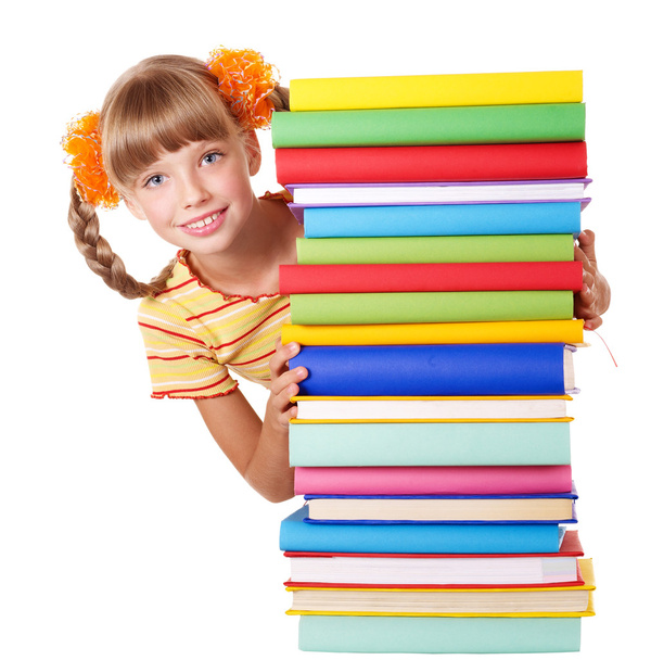 Colegiala sosteniendo pila de libros
. - Foto, imagen