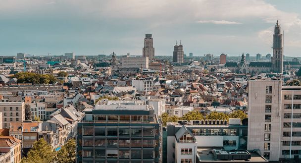 Antwerp, Belgium - August 8, 2021 - panoramic aerial view of downtown Antwerp from the rooftop of MAS Museum with buildings an churches - Photo, Image