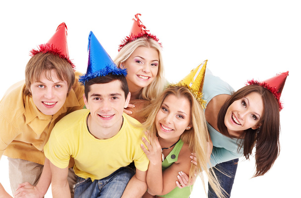 Grupo de jóvenes en sombrero de fiesta
. - Foto, imagen