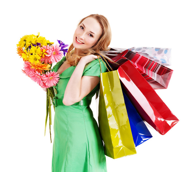 Fiatal nő bevásárló táskával. - Fotó, kép