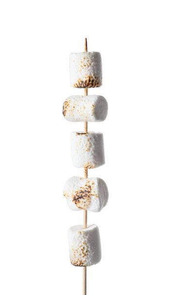 Skewer with delicious grilled marshmallow on white background, closeup - Photo, Image
