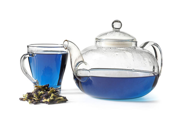 Cup and teapot of butterfly pea flower tea on white background - Photo, Image