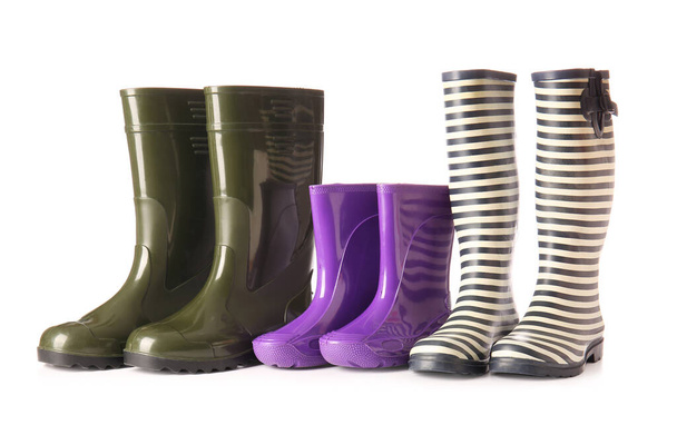Many different rubber boots on white background - Photo, Image