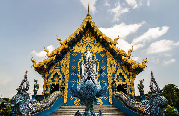 Chiang Rai, Thailand - Sep 05, 2020 : Elaborate sculptures of Buddhist church at the famous Wat Rong Suea Ten Temple (Blue Temple) in Chiang rai, Thailand. Selective Focus. - Fotoğraf, Görsel