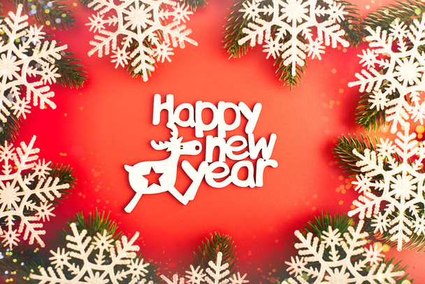 Sparkle bokeh lights on red canvas background. Merry christmas card. Winter holiday theme. Happy New Year. - Photo, Image
