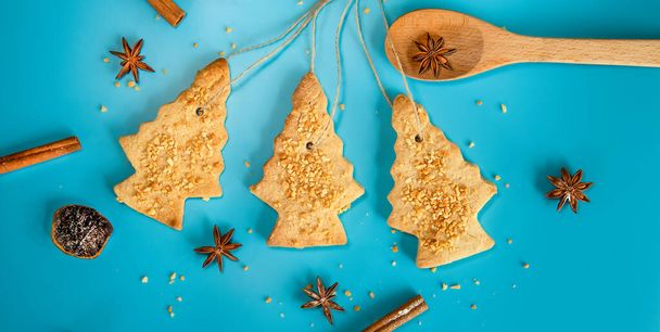 christmas tree cookies and spices, xmas festive background, baking with kids, sweet winter holiday dessert - Photo, Image