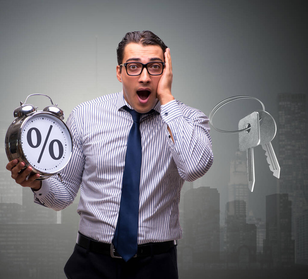 Young businessman surprised at high interest mortgage rates - Photo, Image