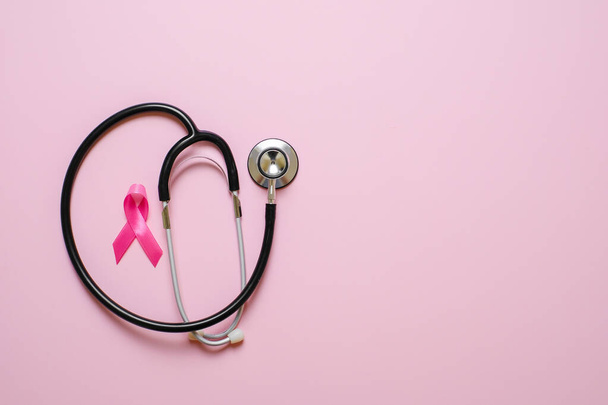 Breast cancer awareness flatlay layout concept over pink background - Photo, Image