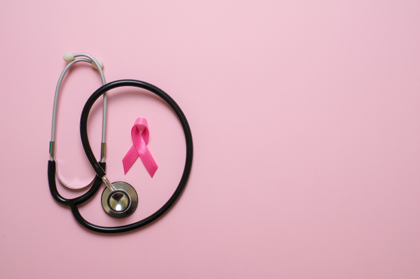 Breast cancer awareness flatlay layout concept over pink background - Zdjęcie, obraz