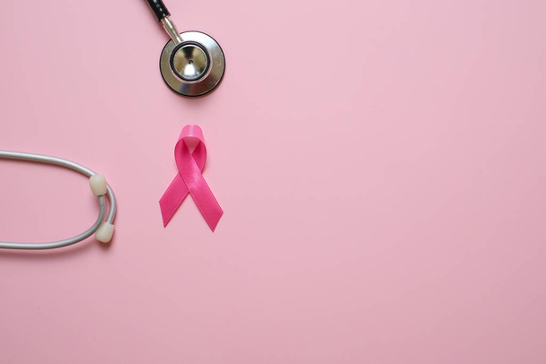 Breast cancer awareness flatlay layout concept over pink background - Fotó, kép