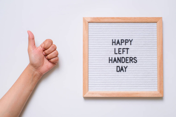 Letter board incription happy left hander day on white background - Photo, Image