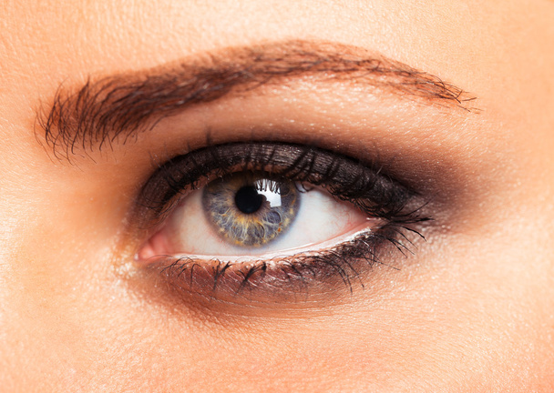 Closeup of beautiful womanish eye with glamorous makeup - Photo, Image