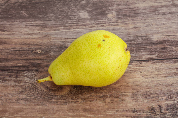 Sweet tasty ripe Yellow pear over background - Valokuva, kuva