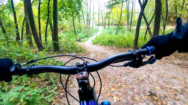 Amateur rider on the bicycle in the fall season - Photo, Image