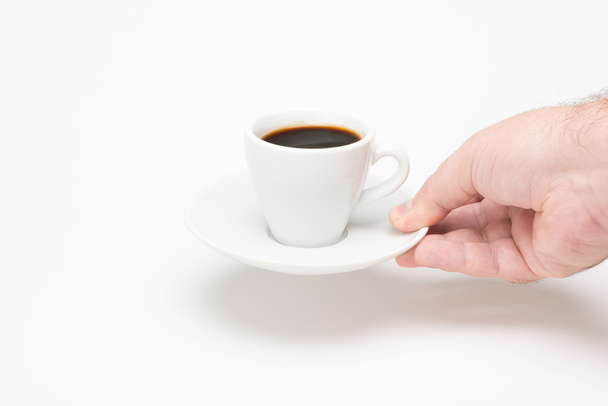 Cup of coffee with hand - Foto, imagen