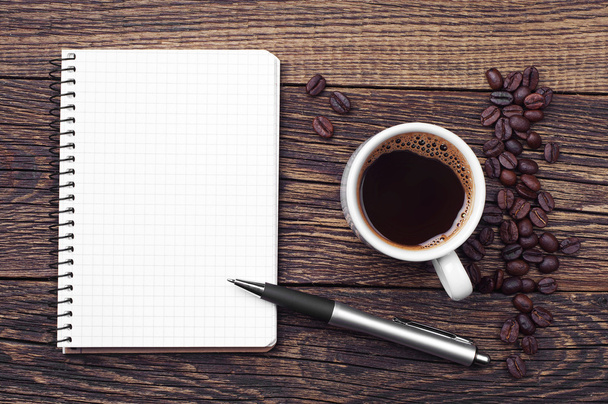 Notepad and cup of coffee - Photo, Image
